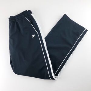 nike black sweatpants with white stripe